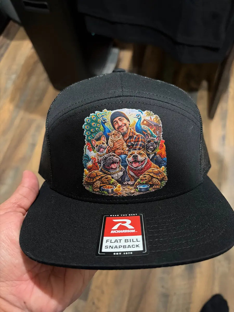Detailed full-color artwork applied to a black cap